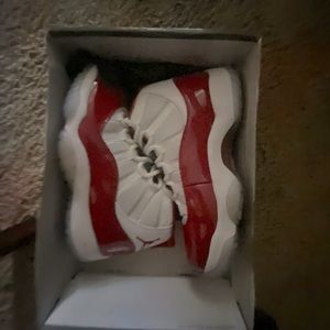 Jordan 11s cherry reds